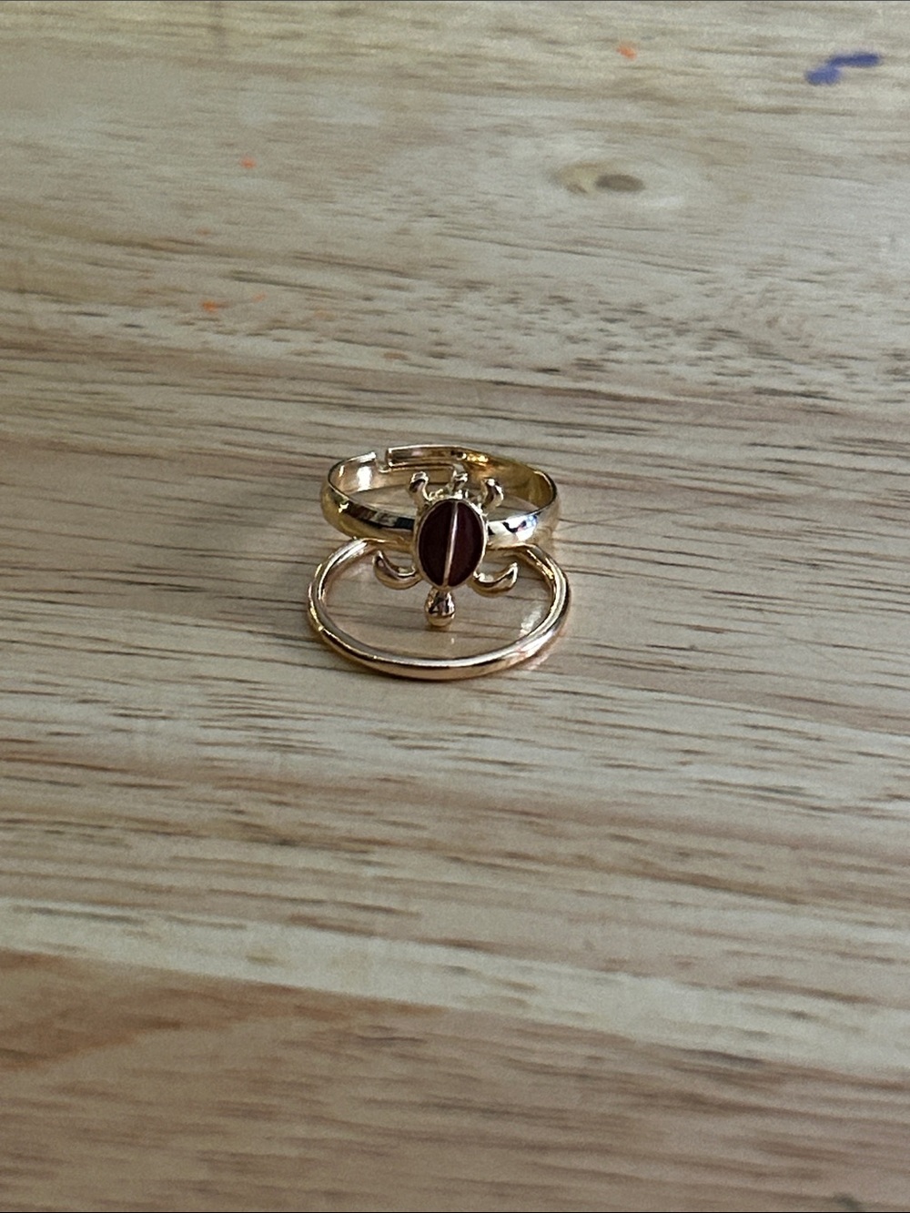 Gold-Tone Ring with Dark Red Oval Stone - Women's Jewelry